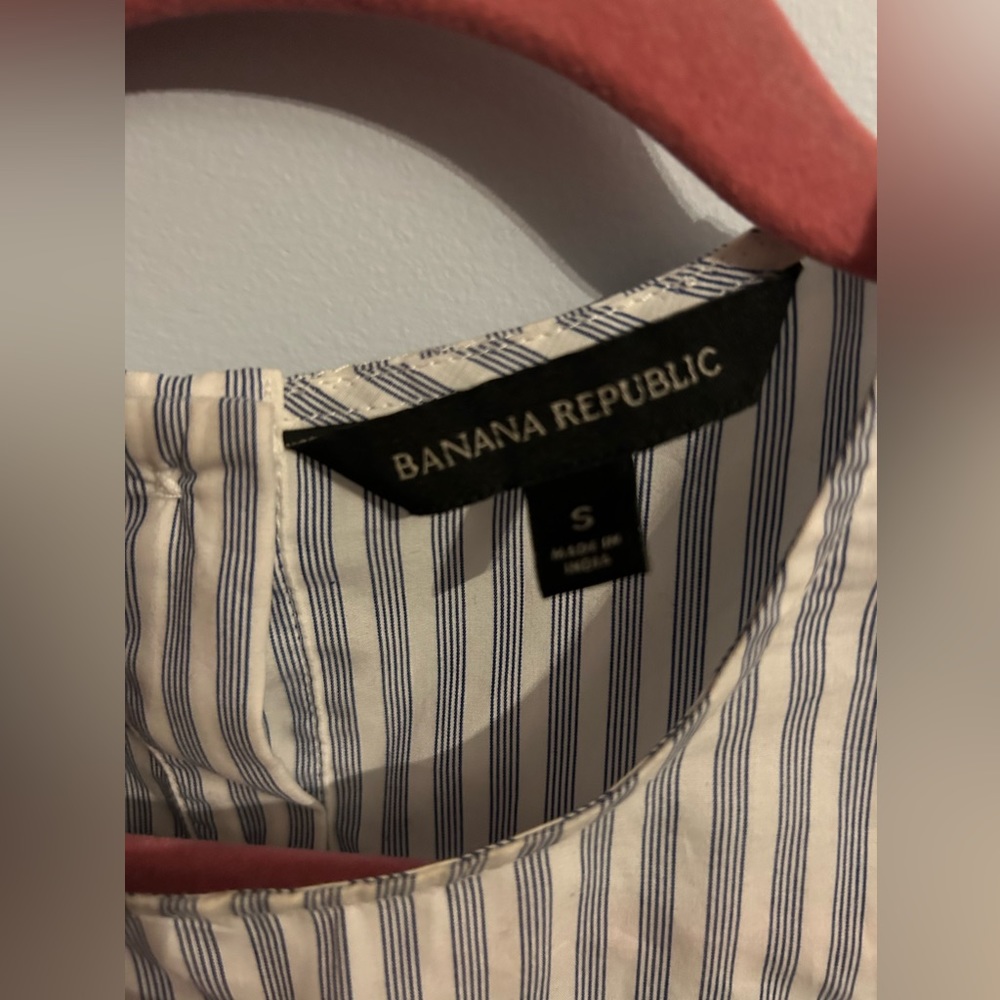 Size Small Banana Republic blue and white striped dress shirt with bows on wrist